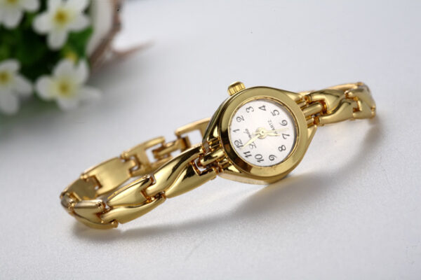 OL Women's Carved Gold Stainless Steel Fashion Watch - Image 7